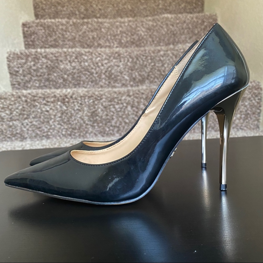 Classy black stilettos with silver heel